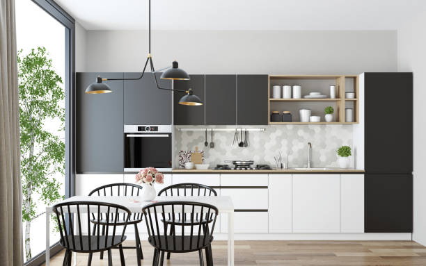 Stylish kitchen interior with granite countertops and white cabinetry, representing a custom design for functional elegance.