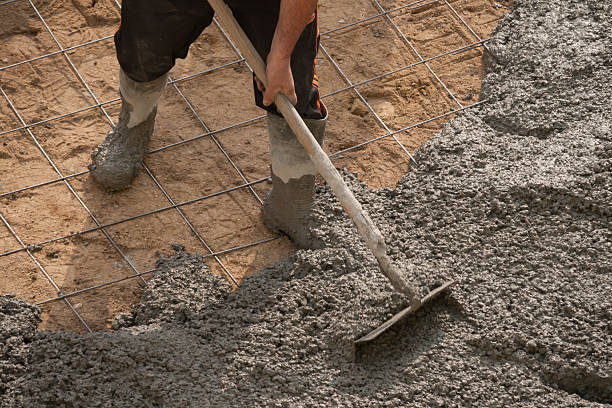 construction workers set the concrete material, showcasing teamwork at Best Concrete Contracting in Sonoma, CA.