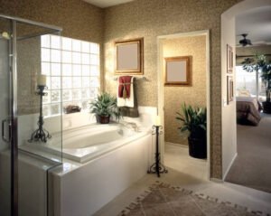 A modern bathroom featuring a spacious tub and a separate shower, showcasing a stylish remodeling design.