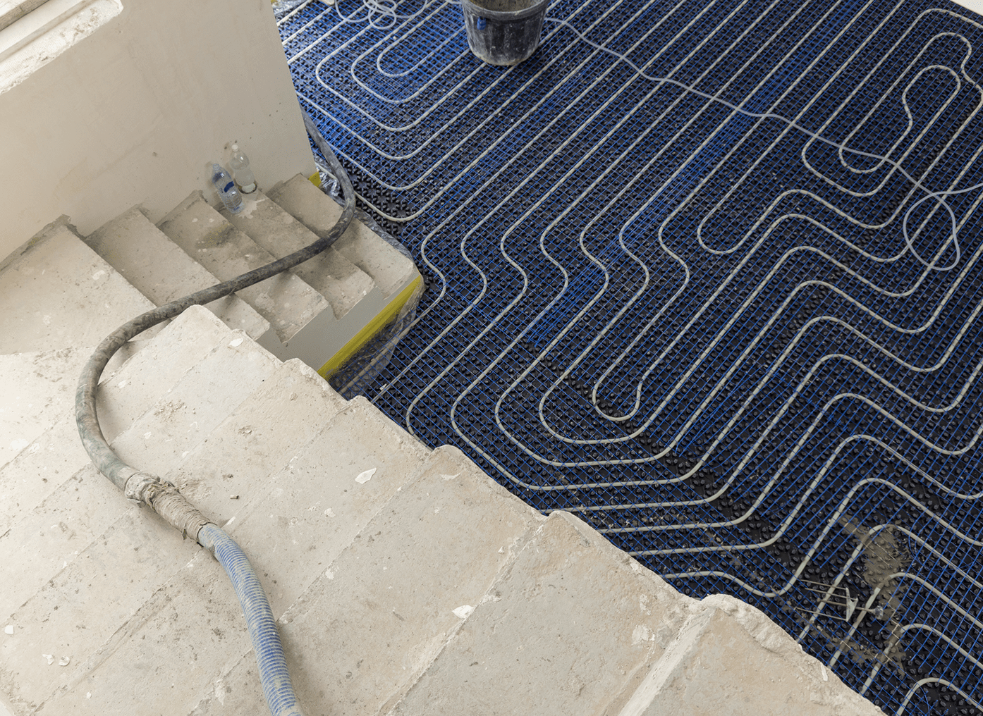 Construction site with heating system installation